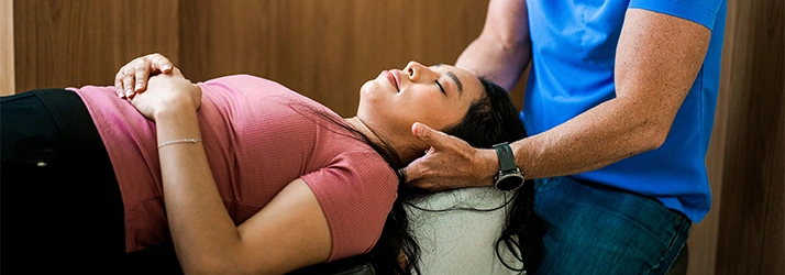 Chiropractor San Antonio TX Dan Foss Adjusting Woman